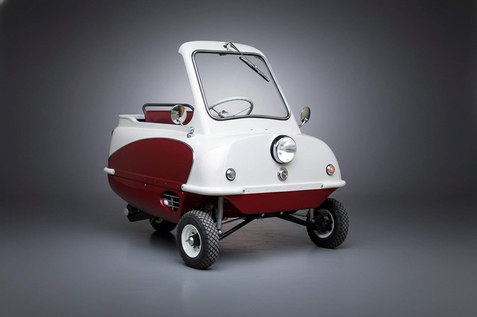 replace the background of this image of a rear angled view of a peel p50 convertible with a high end automotive photostudio backdrop like in premium automotive photography.